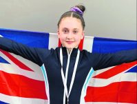 Gymnast Poppy beams with delight after latest successes