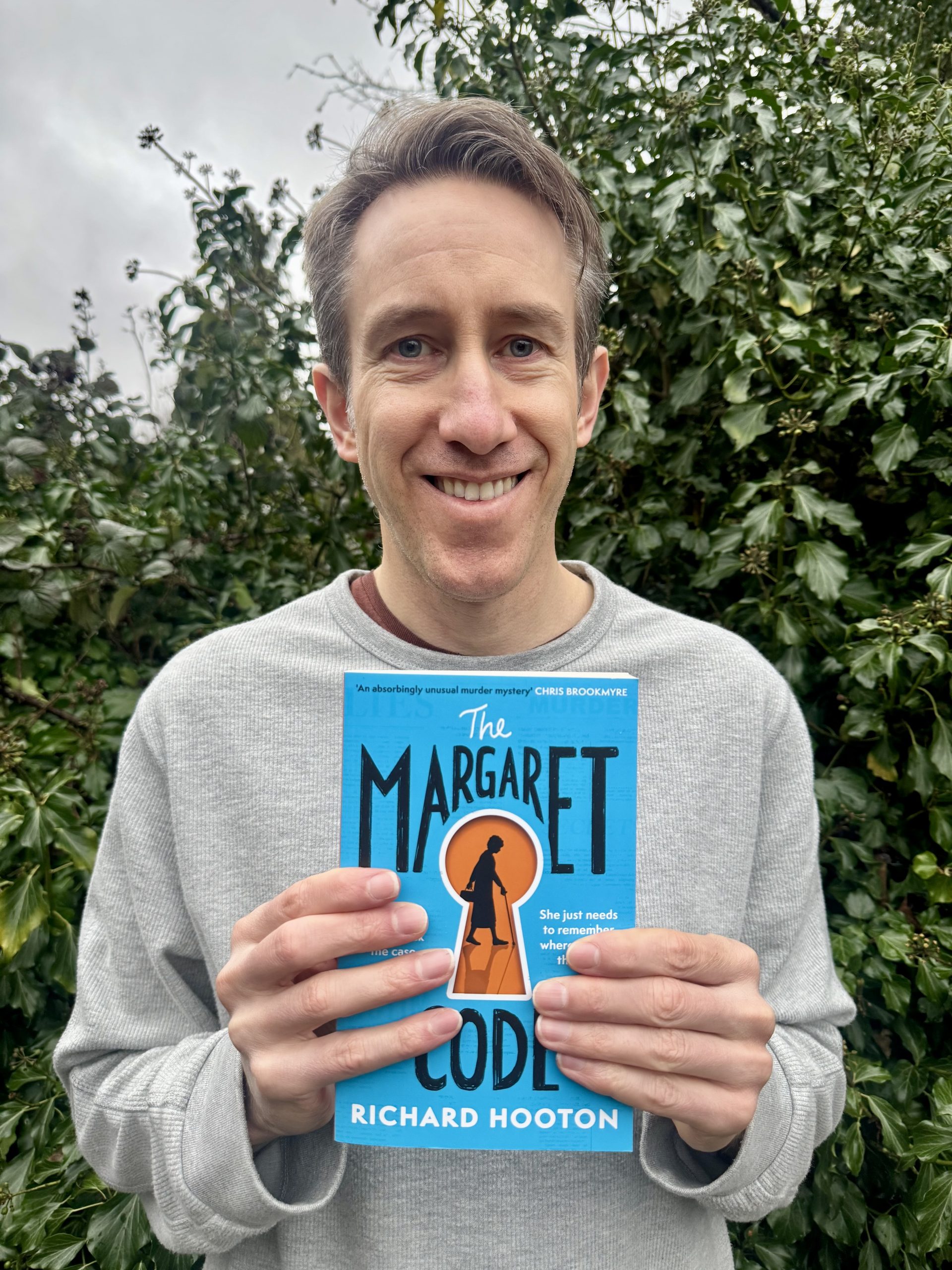 Richard Hooton with the paperback of his novel The Margaret Code Mossley author’s acclaimed debut crime novel set for paperback release